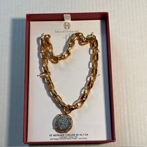 House of Harlow 1960 gold-tone 18-inch necklace silver-toned medallion pendant.